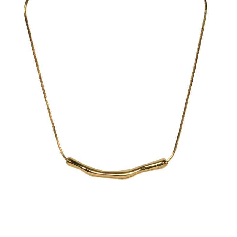 18K gold plated stainless steel necklace with a curved tube pendant on a fine chain, displayed flat.