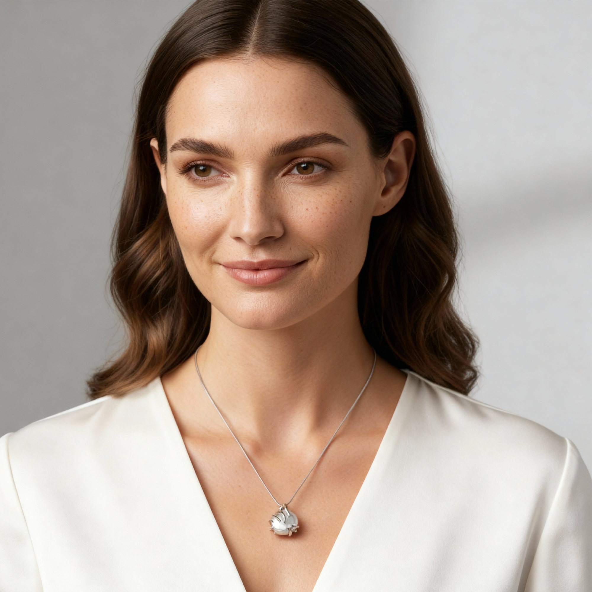 # Calypso Pearl Necklace-Silver featuring 925 silver shell pendant with pearl on delicate chain.