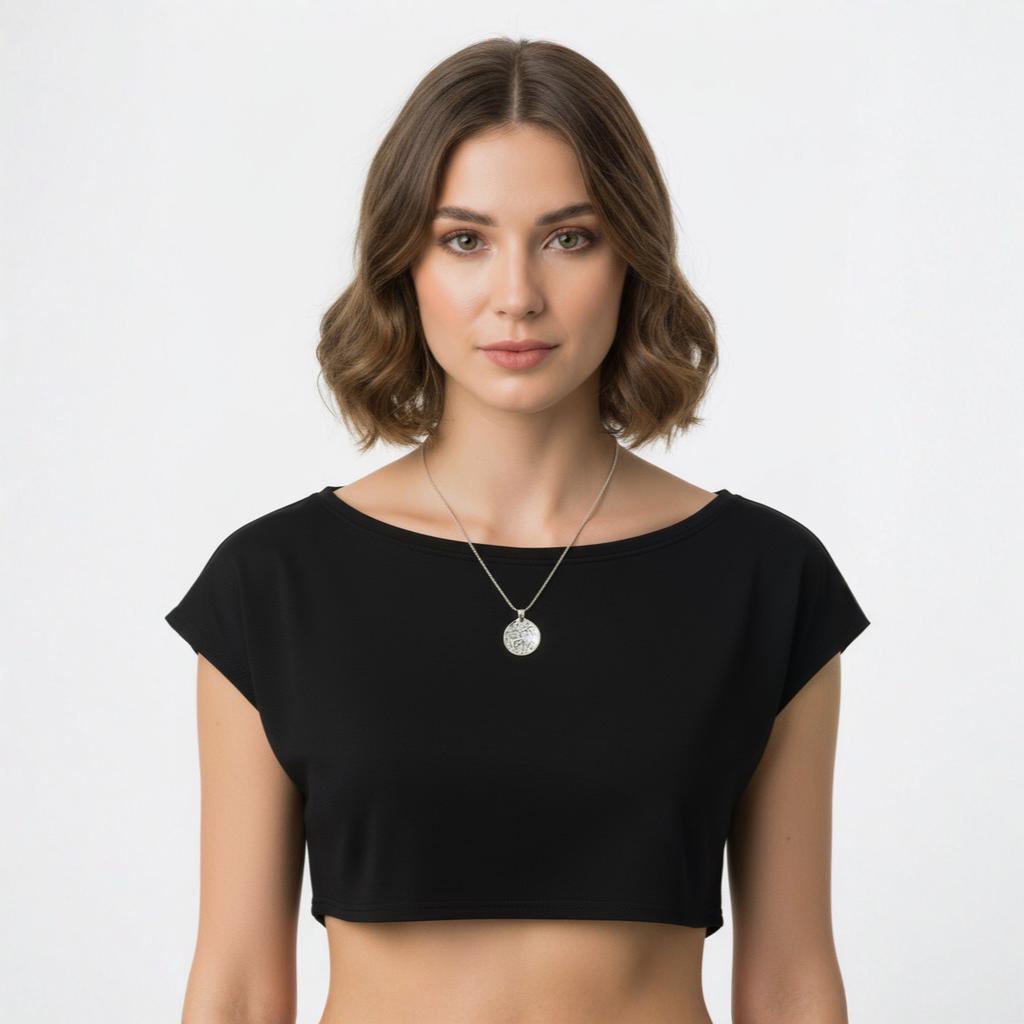 Orion Necklace, a 925 silver necklace, shown on a model wearing a black crop top.