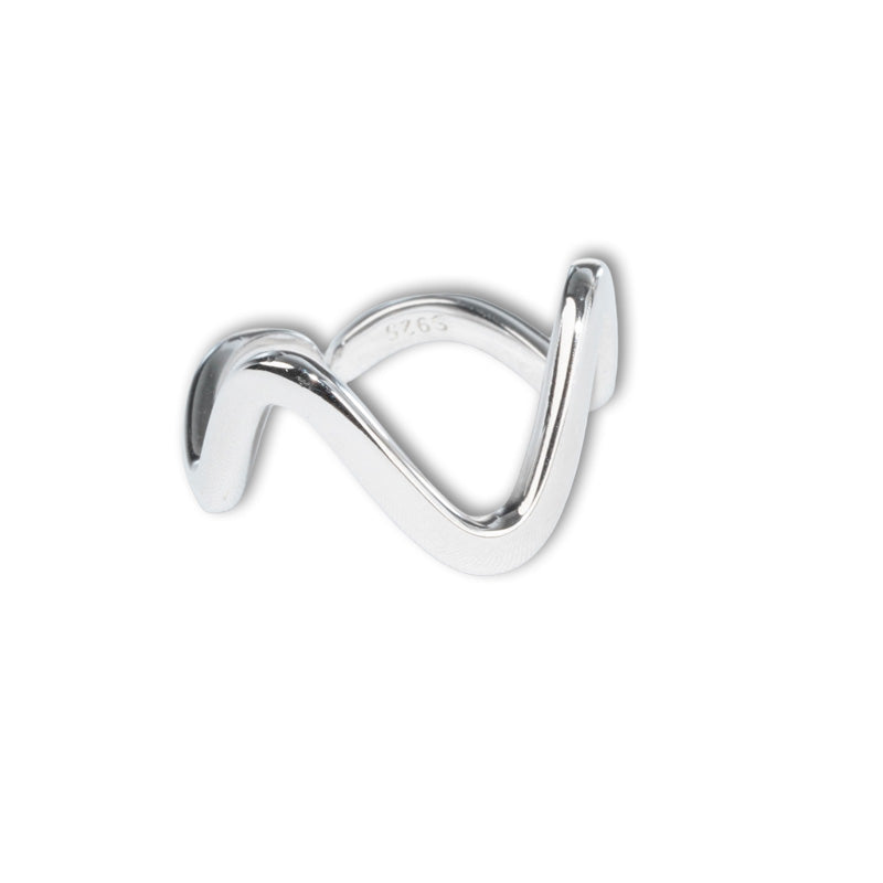 Luca Ring, a 925 silver ring with a flowing wave design, shown at an angle displaying its sculptural form.