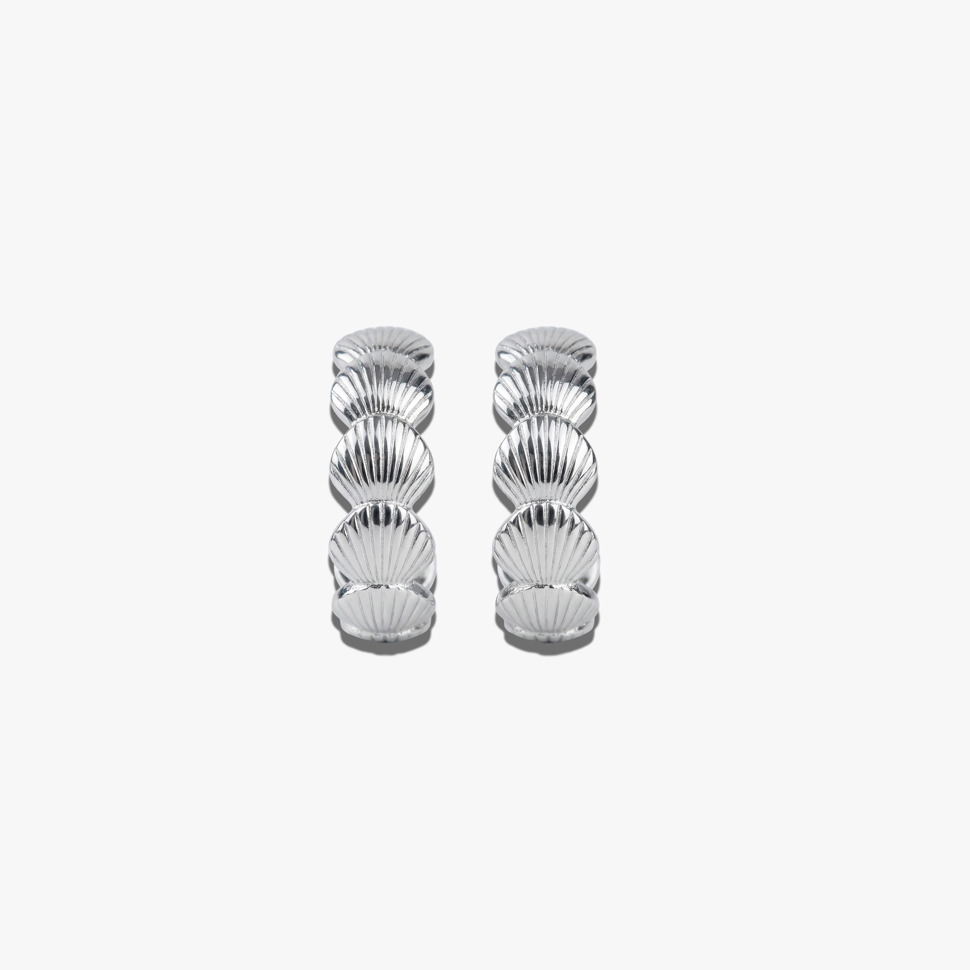 Isla Hoops-Silver 925 silver earrings with scalloped shell design and silver plating.
