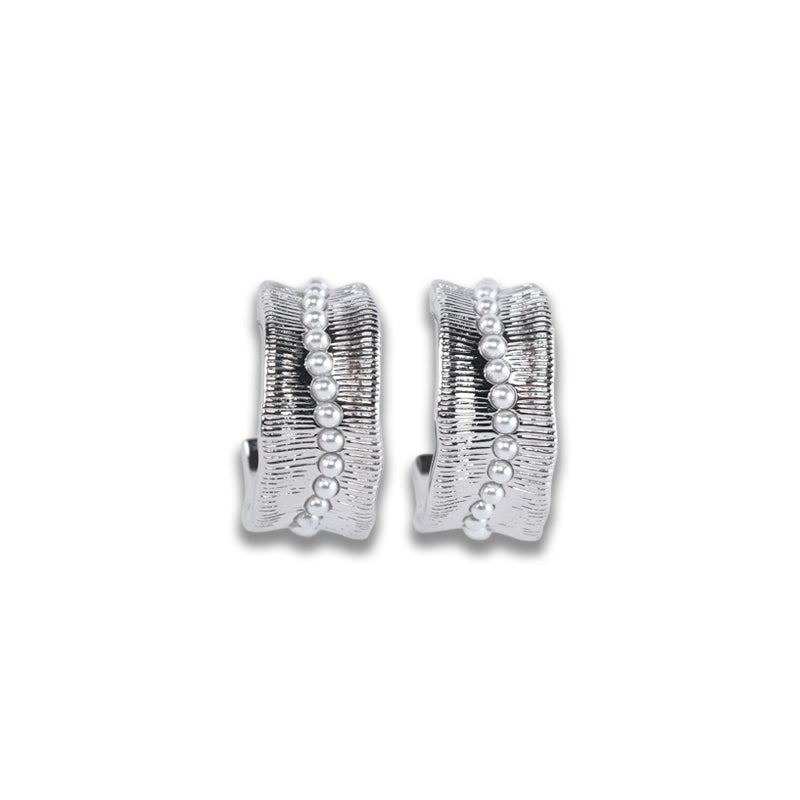 Lucian Earrings- Silver, a 925 silver hoop earring with textured surface and beaded edge detail, shown as a pair from front view.