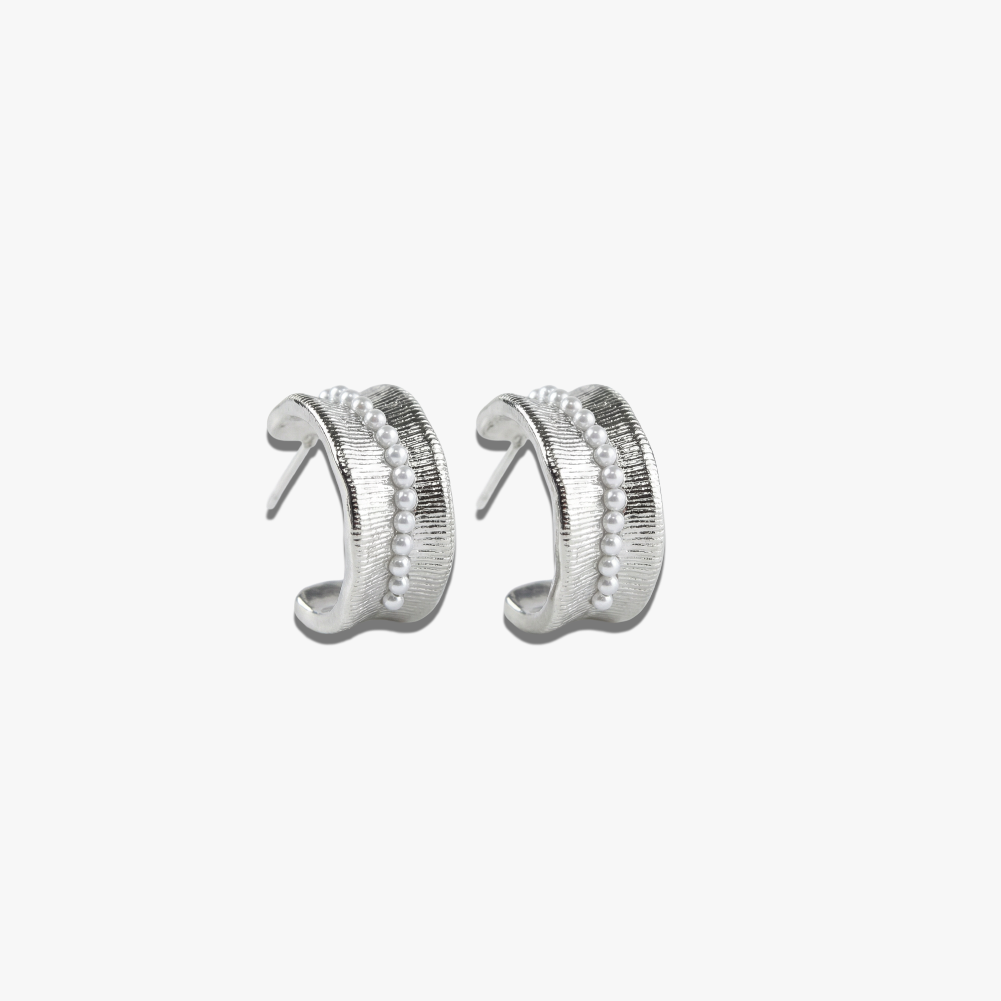 # Lucian Earrings Silver - 925 Silver textured hoop earrings with milgrain detailing