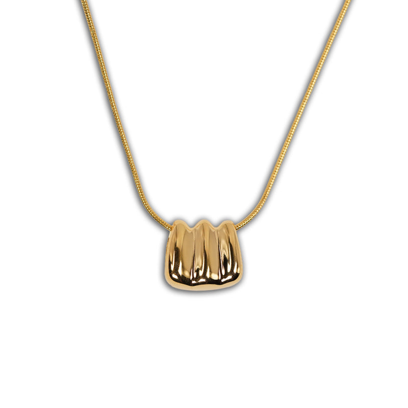 Gold Ripple Necklace, an 18K gold plated 925 silver necklace with a textured rippled pendant, shown at an angle.