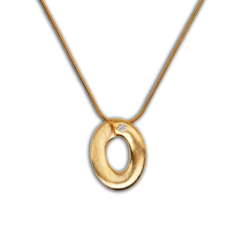 Ophelia Necklace in 18K gold plated 925 silver with oval pendant and small diamond accent, shown on chain.