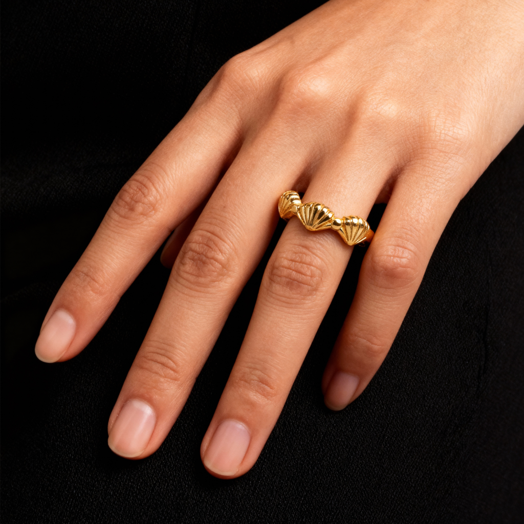 Gold plated scallop shell ring on hand, 925 silver with 14K gold plating