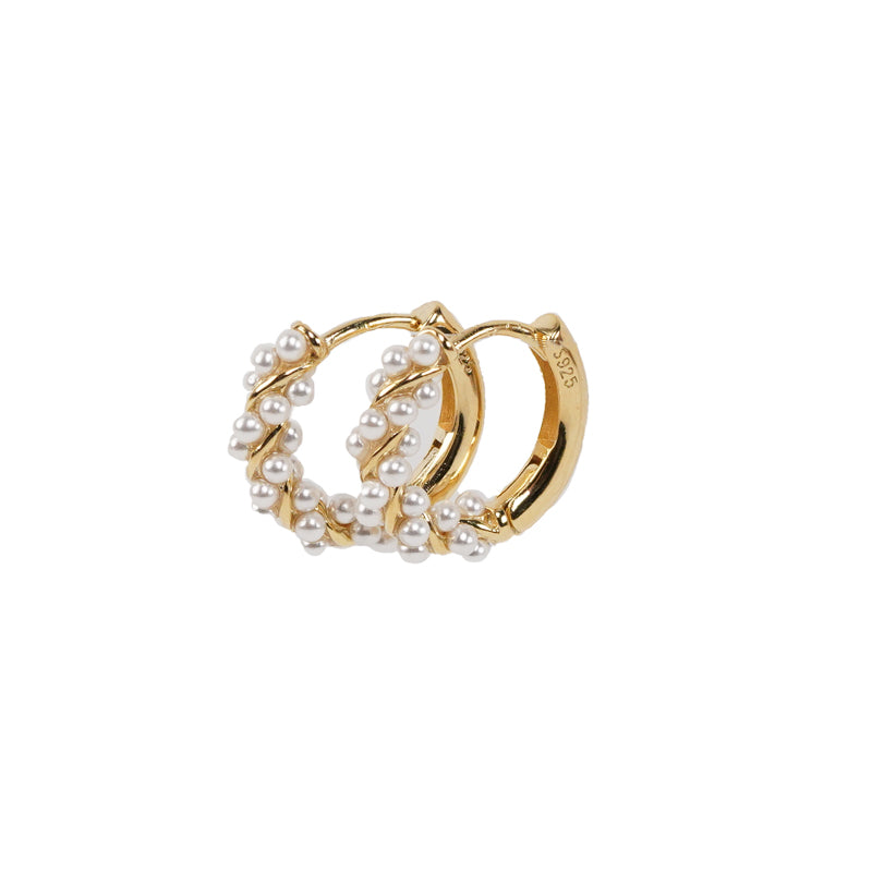 Sea Whisper Earrings, 14K gold plated 925 silver huggie hoop earrings adorned with small white pearls in a spiral design.