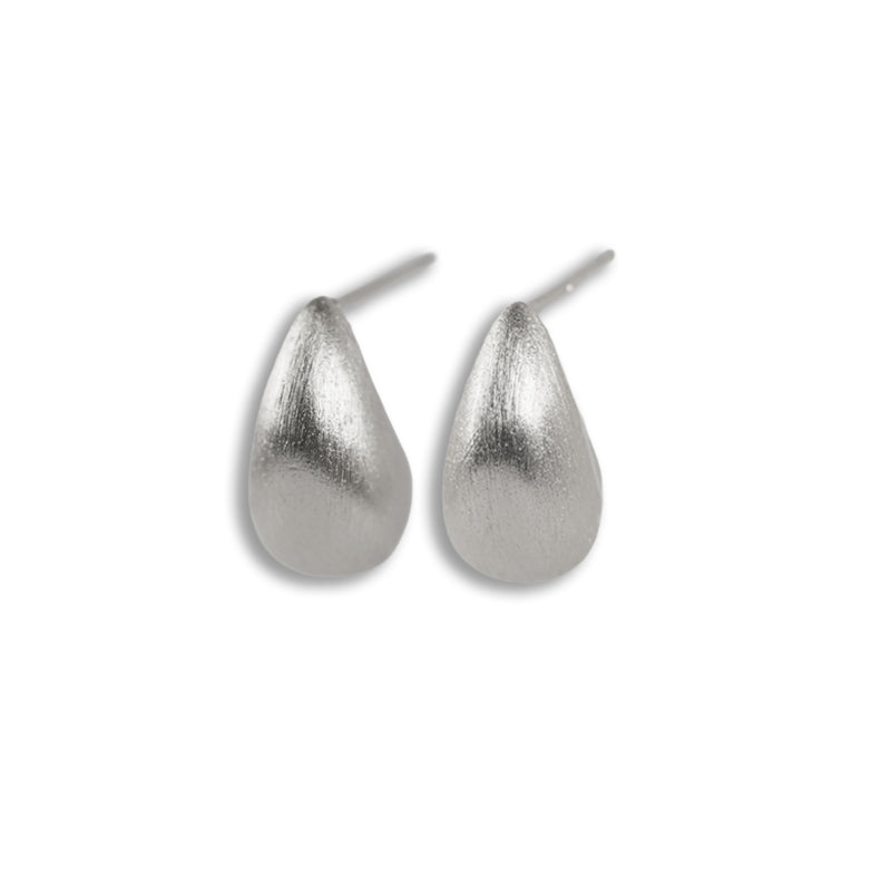 Chiara Earrings- Silver, a 925 silver teardrop stud earring, shown as a pair from above.