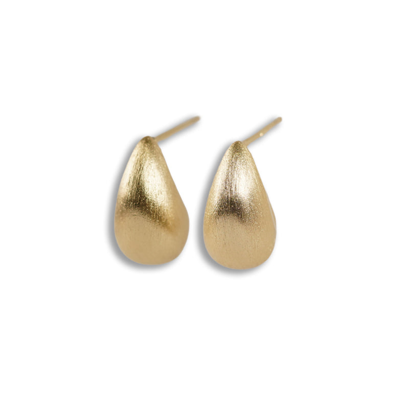 Chiara Earrings- Gold, a 14K gold plated 925 silver earring pair in teardrop shape, shown from above at an angle.