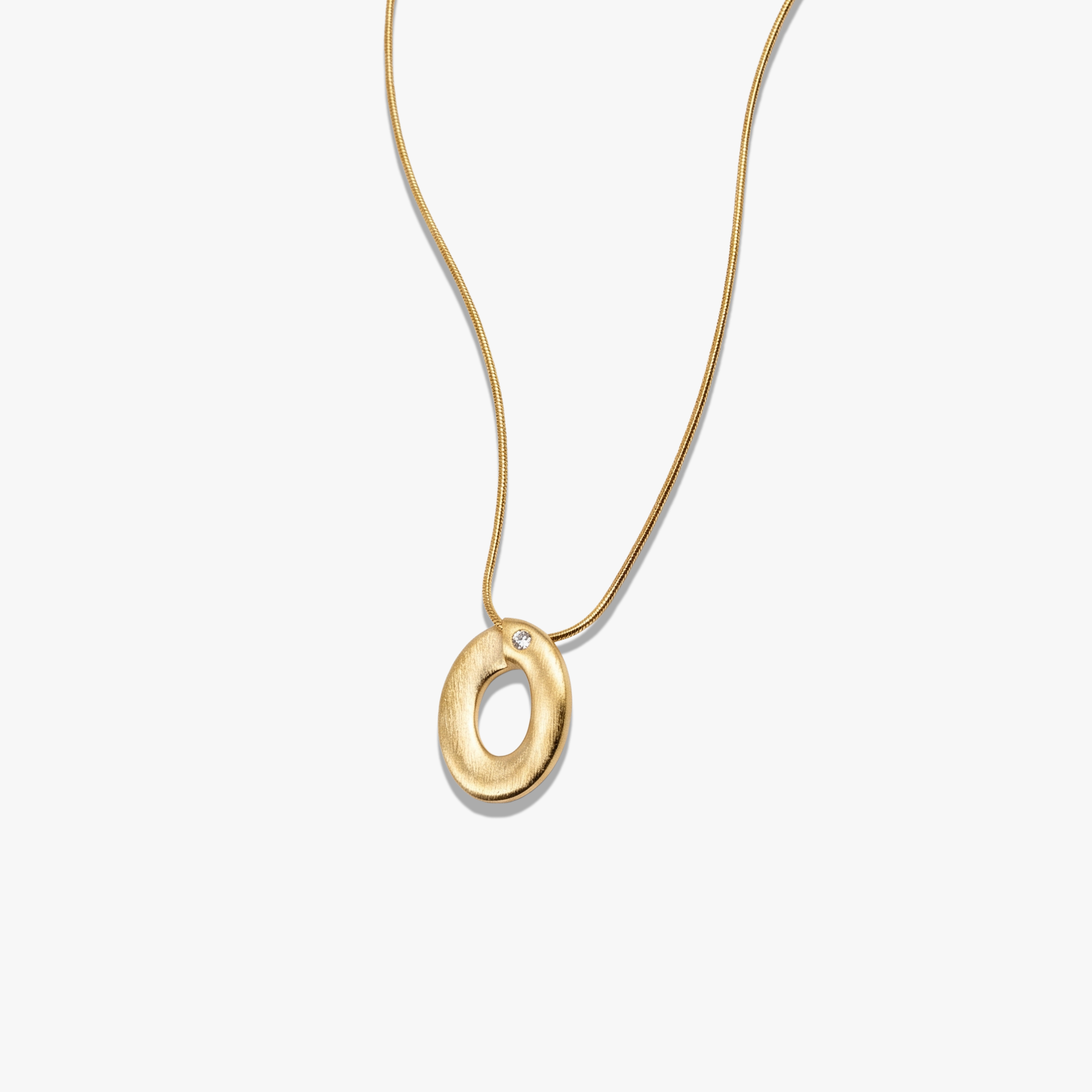 Gold plated oval pendant necklace with textured finish on snake chain, Ophelia Necklace Gold