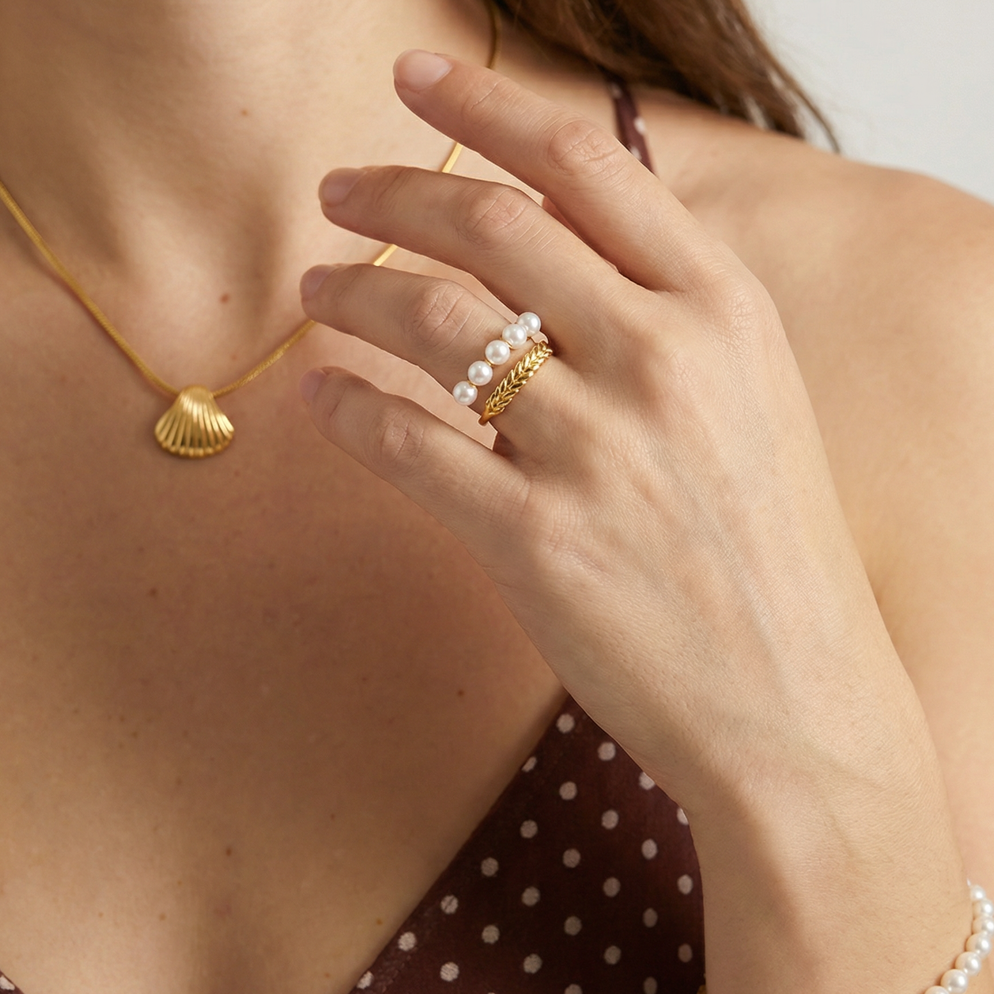 Pearlflow Ring featuring white pearls and gold chain design in 18K gold plated silver