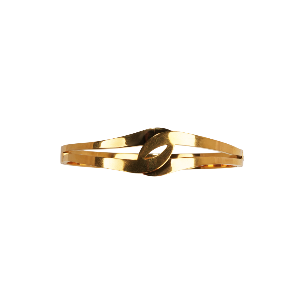 Gold-plated stainless steel Arabella Bangle with twisted knot design on black background.