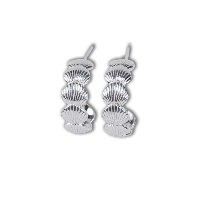 Isla Hoops-Silver, a 925 silver hoop earring featuring three stacked scallop shell designs, shown from the front.