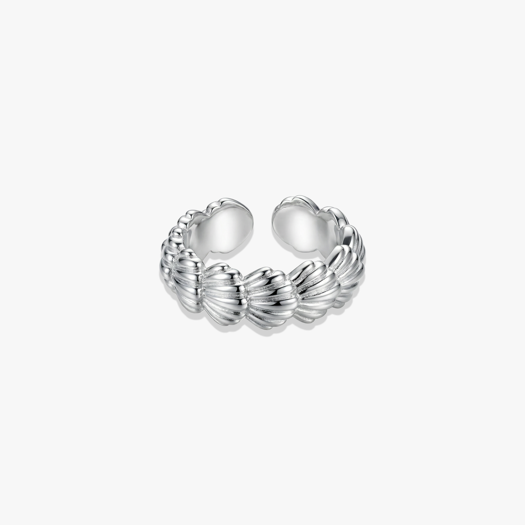 Shiloh Ring, textured silver 925 band with ridged wave pattern and open back design.