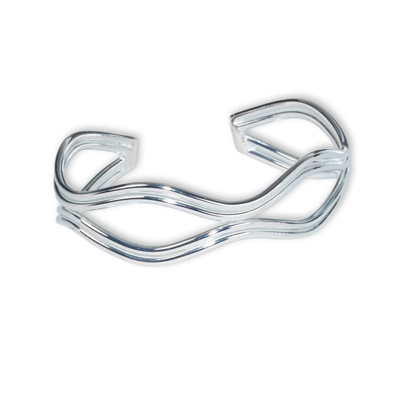 Valentina Bangle in 925 silver with flowing wavy design, shown from an angled overhead view.