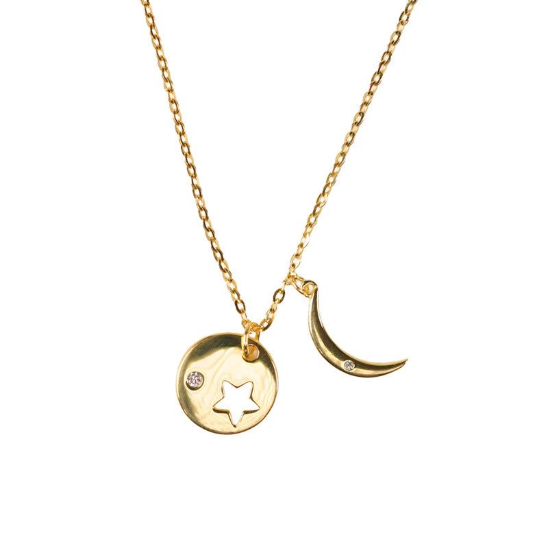 Esther 18k Gold Necklace, an 18K gold plated 925 silver necklace with star disc and crescent moon charms, shown flat.